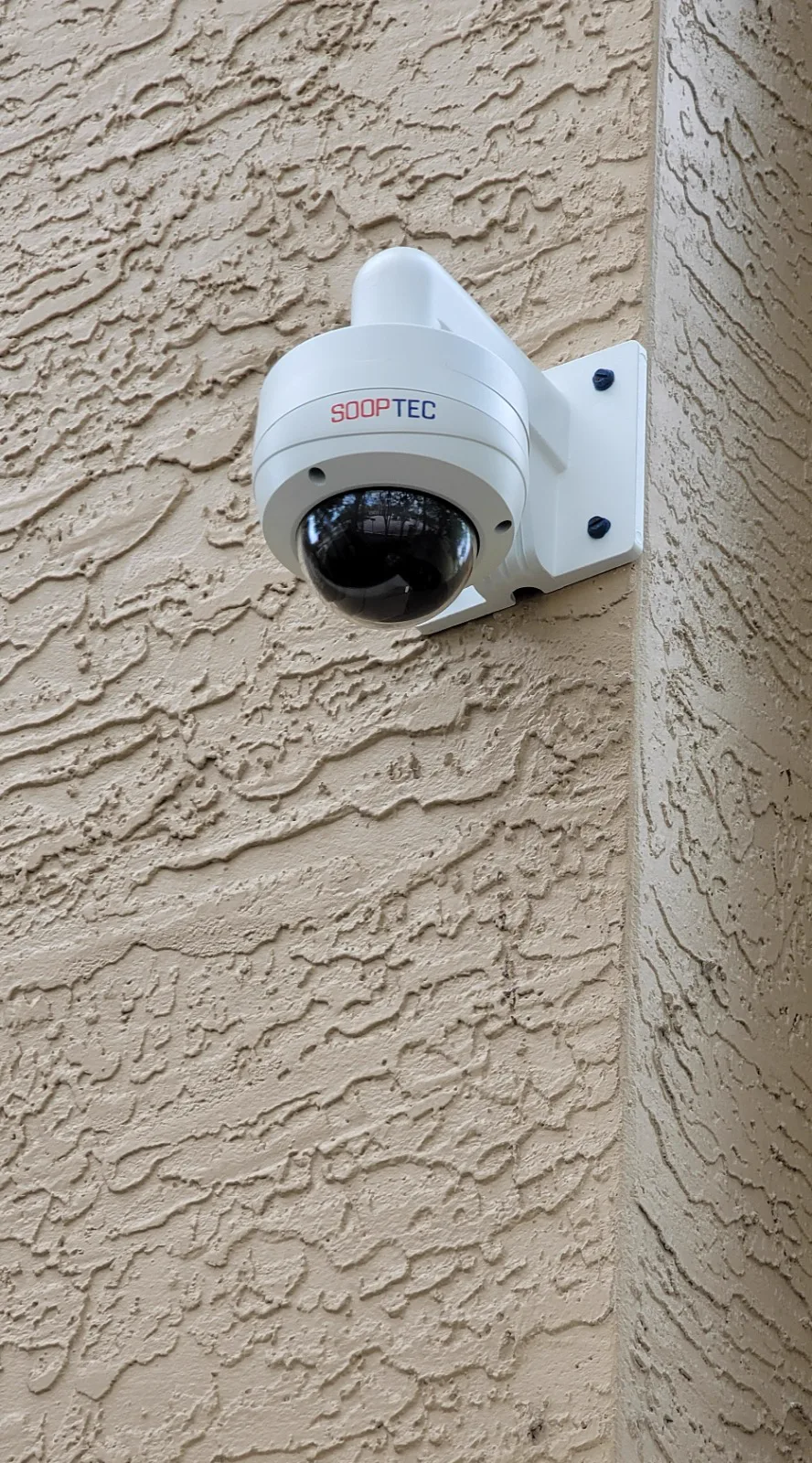 SOOPTEC dome camera installed on an exterior wall